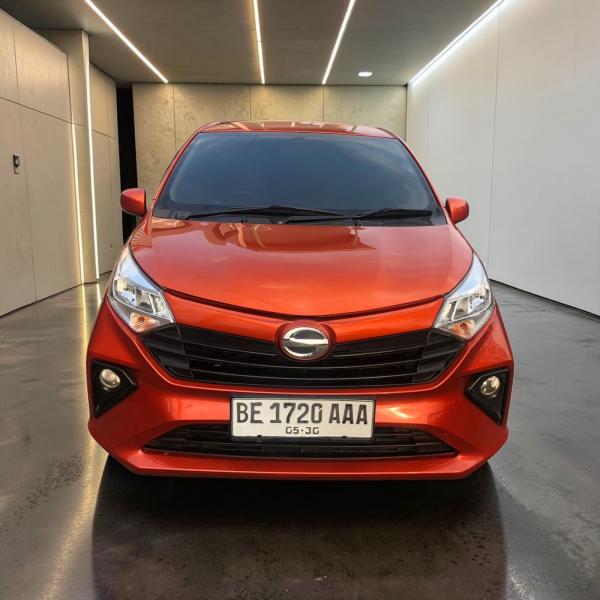 SIGRA M 1.0 MT 2020 ORANGE